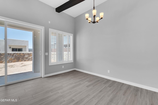 13829 Summer View Ave, Horizon City, TX 79928 - spare room featuring a chandelier and wood finished floors