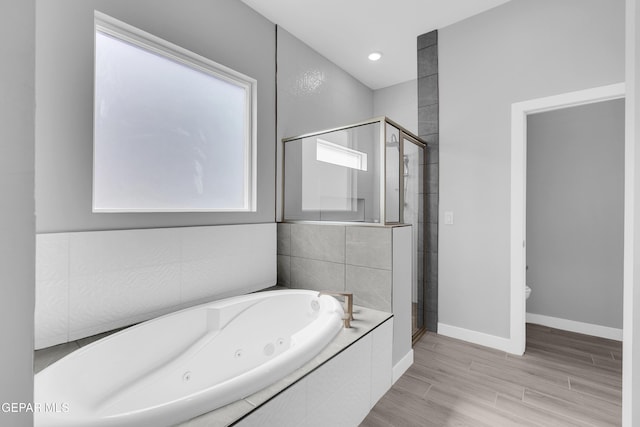 13829 Summer View Ave, Horizon City, TX 79928 - full bathroom with a stall shower, a whirlpool tub, wood finished floors, and recessed lighting