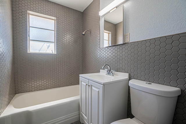 1400 Elmhurst Dr, El Paso, TX 79925 - bathroom featuring vanity,  shower combination, and tile walls