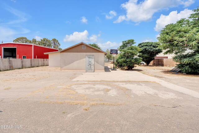 exterior space with an outbuilding