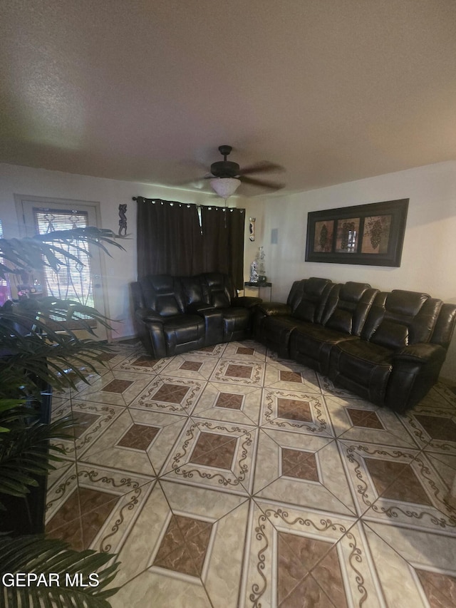 14185 Silver Point Ave, El Paso, TX 79938 - living area featuring tile patterned floors and a ceiling fan
