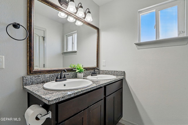 12469 Lanchester Dr, El Paso, TX 79928 - full bath with double vanity and healthy amount of natural light