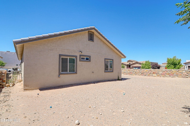12469 Lanchester Dr, El Paso, TX 79928 - back of house with stucco siding