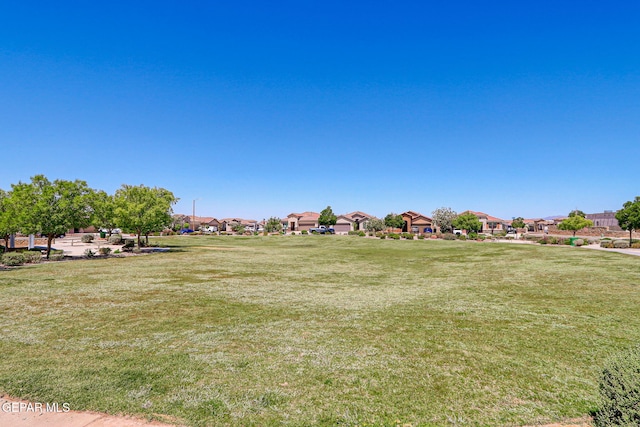 12469 Lanchester Dr, El Paso, TX 79928 - surrounding community with a yard and a residential view