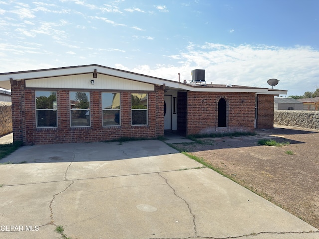 378 Hourglass Dr, El Paso, TX 79915 - view of front of house featuring brick siding and concrete driveway
