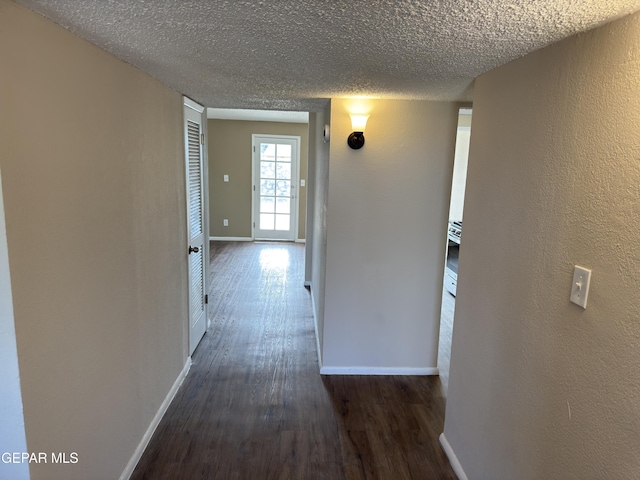 378 Hourglass Dr, El Paso, TX 79915 - hall featuring wood finished floors and a textured ceiling