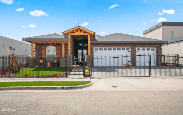 14516 Ciambriello Ave, El Paso, TX 79938 - view of building exterior with a fenced front yard, a garage, and concrete driveway