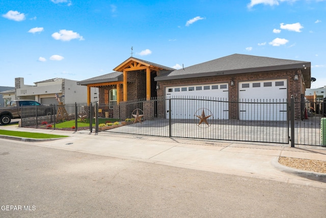 14516 Ciambriello Ave, El Paso, TX 79938 - view of front of property featuring brick siding, concrete driveway, an attached garage, a fenced front yard, and a shingled roof