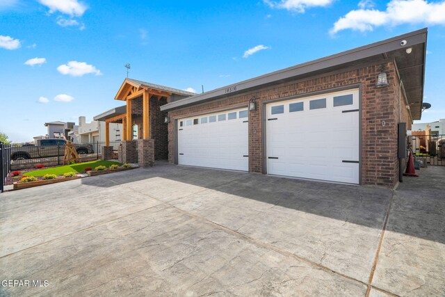 14516 Ciambriello Ave, El Paso, TX 79938 - view of front of home with brick siding and driveway