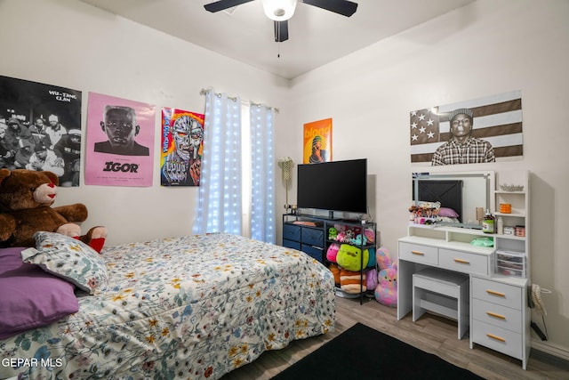 14516 Ciambriello Ave, El Paso, TX 79938 - bedroom with wood finished floors and a ceiling fan