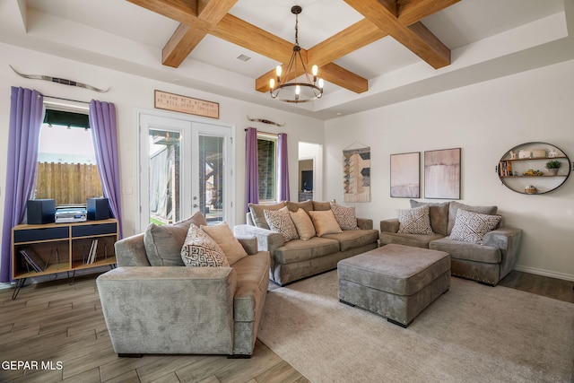 14516 Ciambriello Ave, El Paso, TX 79938 - living room with coffered ceiling, a chandelier, french doors, wood finished floors, and beam ceiling