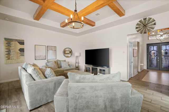 14516 Ciambriello Ave, El Paso, TX 79938 - living room featuring a chandelier, coffered ceiling, beam ceiling, and wood finished floors