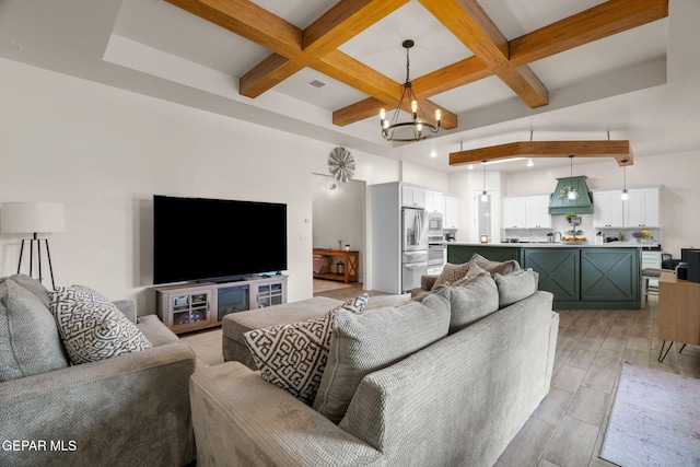 14516 Ciambriello Ave, El Paso, TX 79938 - living room with beam ceiling, coffered ceiling, a chandelier, and light wood-style floors