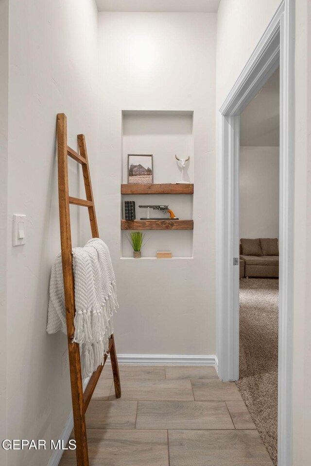 14516 Ciambriello Ave, El Paso, TX 79938 - corridor with wood finished floors and baseboards