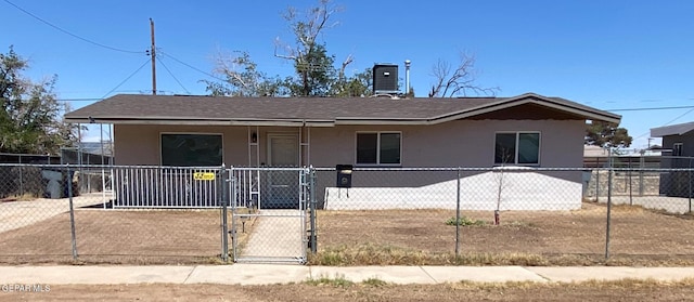 10356 Preston Dr, El Paso, TX 79924 - view of front of house featuring a gate, a fenced front yard, stucco siding, and a shingled roof