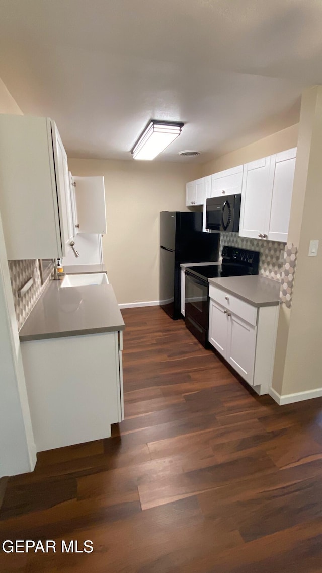 10356 Preston Dr, El Paso, TX 79924 - kitchen featuring black appliances, backsplash, white cabinetry, and dark wood finished floors