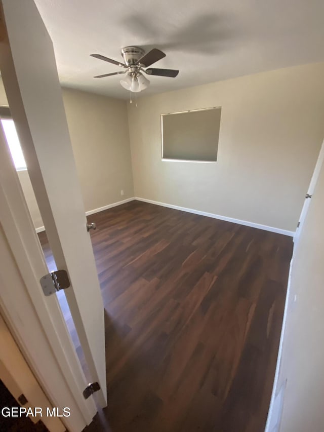 10356 Preston Dr, El Paso, TX 79924 - unfurnished room featuring dark wood-style floors and a ceiling fan