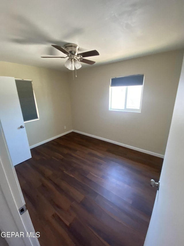 10356 Preston Dr, El Paso, TX 79924 - spare room with dark wood-type flooring and a ceiling fan