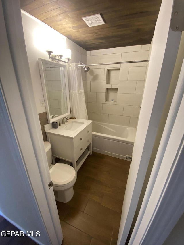 10356 Preston Dr, El Paso, TX 79924 - bathroom featuring wood finished floors, wooden ceiling, shower / bath combo with shower curtain, and vanity