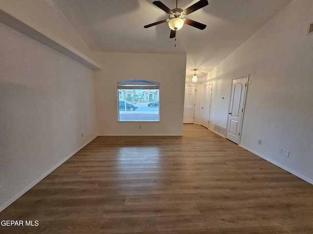 14161 Honey Point Dr, El Paso, TX 79938 - unfurnished room featuring ceiling fan, wood finished floors, and vaulted ceiling