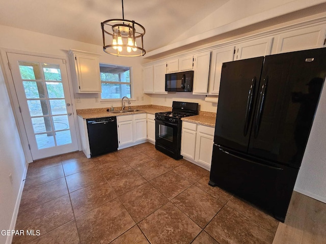 14161 Honey Point Dr, El Paso, TX 79938 - kitchen with black appliances, lofted ceiling, white cabinetry, a chandelier, and pendant lighting