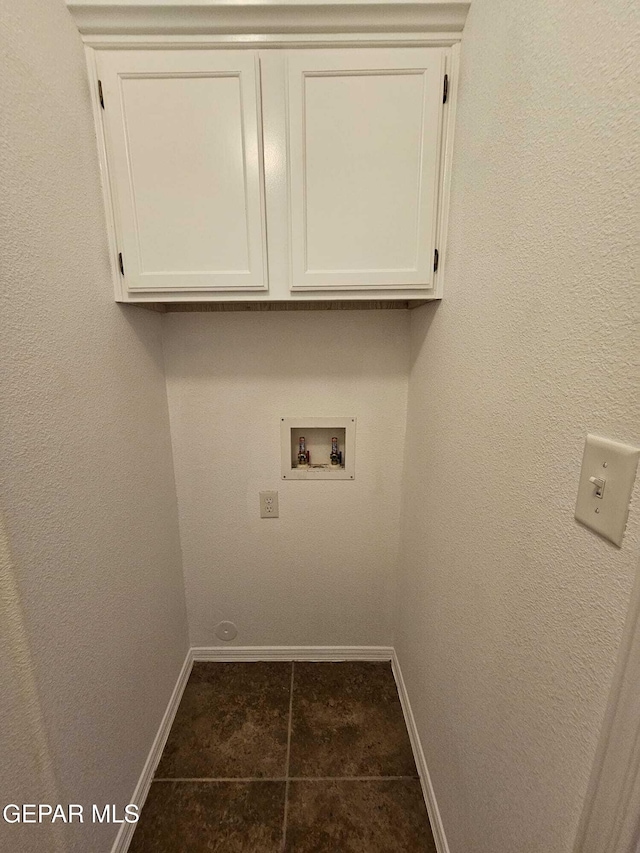 14161 Honey Point Dr, El Paso, TX 79938 - washroom with hookup for a washing machine, cabinet space, and dark tile patterned floors