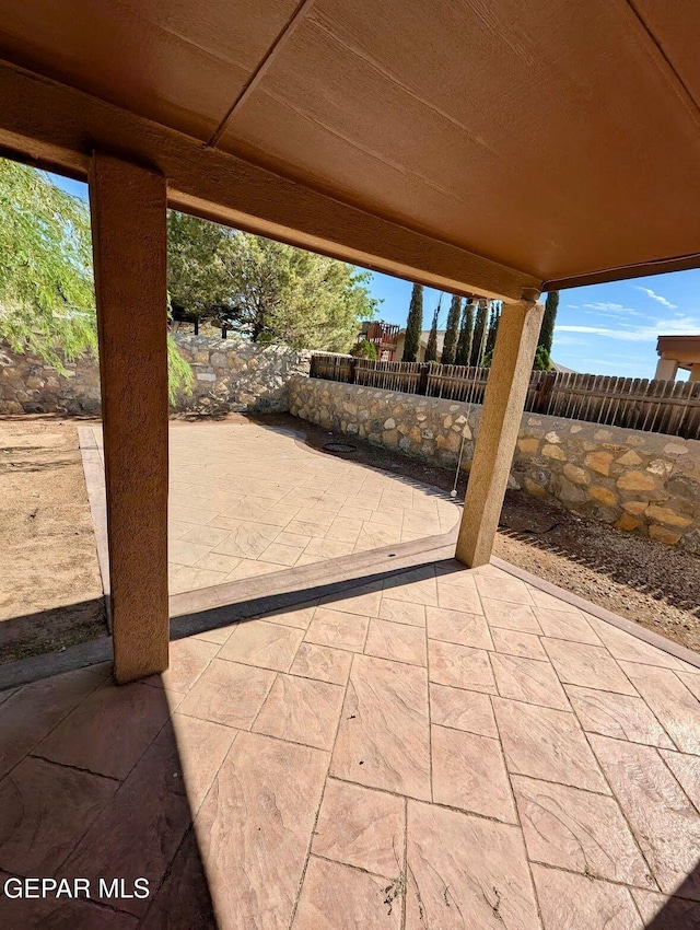 14161 Honey Point Dr, El Paso, TX 79938 - fenced backyard featuring a patio