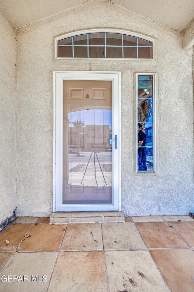 10937 Acoma St, El Paso, TX 79934 - doorway to property featuring stucco siding
