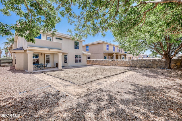 10937 Acoma St, El Paso, TX 79934 - back of house with a patio area and stucco siding