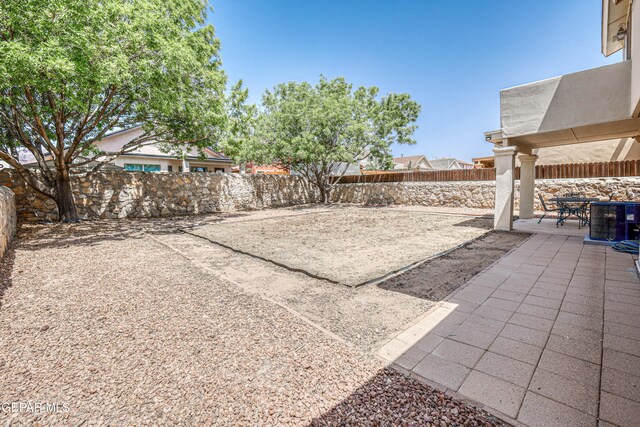 10937 Acoma St, El Paso, TX 79934 - fenced backyard featuring a patio area