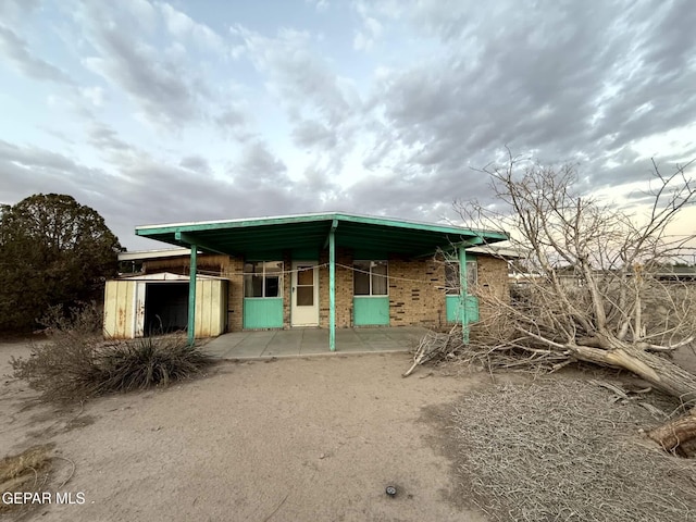 9212 Atun Way, El Paso, TX 79907 - view of front of house with a garage and brick siding