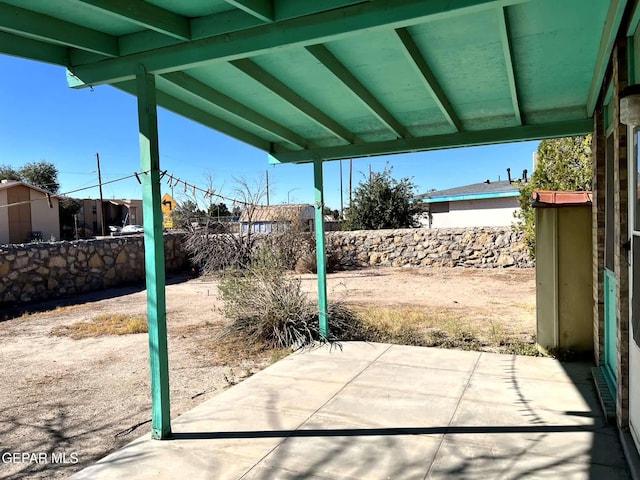 9212 Atun Way, El Paso, TX 79907 - fenced backyard with a patio area