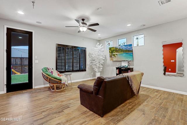 13474 Lawkland St, El Paso, TX 79928 - living room featuring wood finished floors, ceiling fan, and recessed lighting
