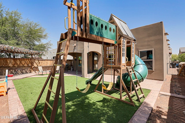 13474 Lawkland St, El Paso, TX 79928 - view of jungle gym with a patio area