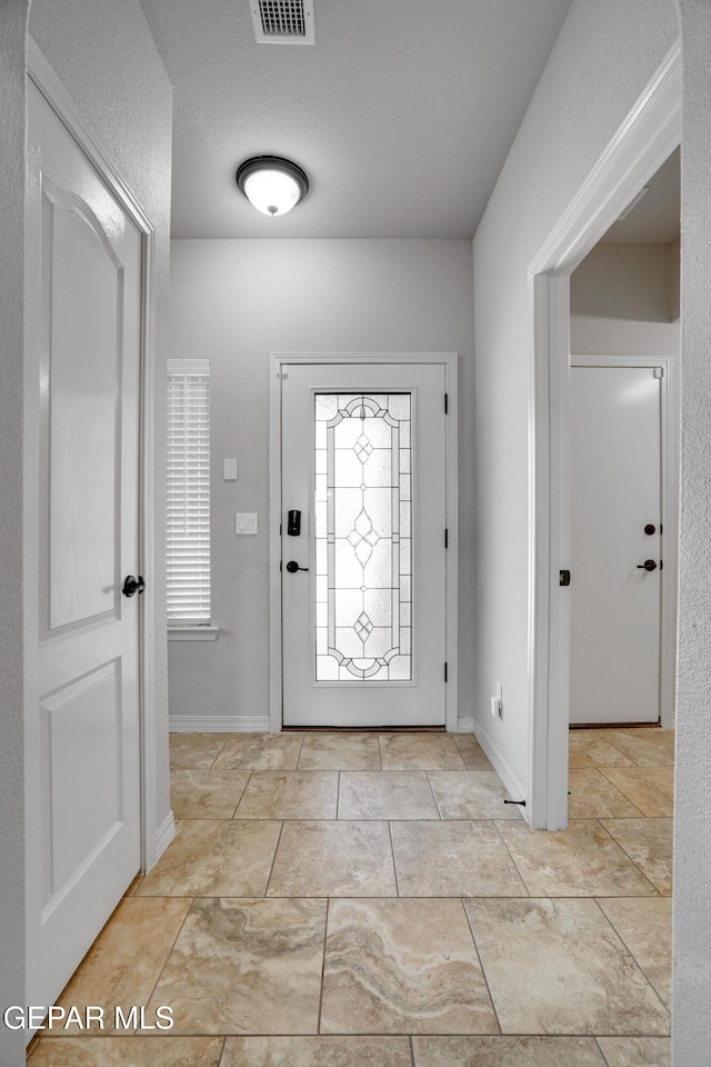 7548 Wolf Creek Dr, El Paso, TX 79911 - entrance foyer with baseboards