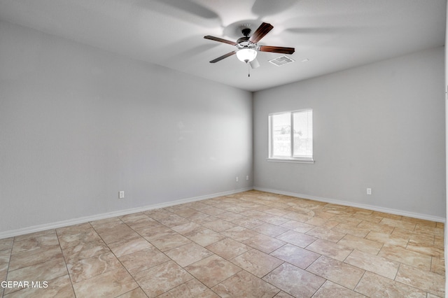 7548 Wolf Creek Dr, El Paso, TX 79911 - unfurnished room featuring a ceiling fan and baseboards