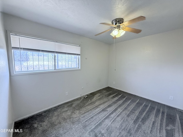 5542 Vancouver St, El Paso, TX 79924 - unfurnished room featuring dark carpet and ceiling fan