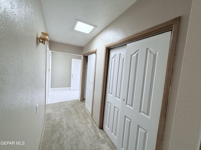 5542 Vancouver St, El Paso, TX 79924 - hall with carpet flooring and a textured wall
