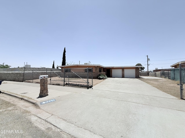 5542 Vancouver St, El Paso, TX 79924 - view of front of property featuring driveway and an attached garage