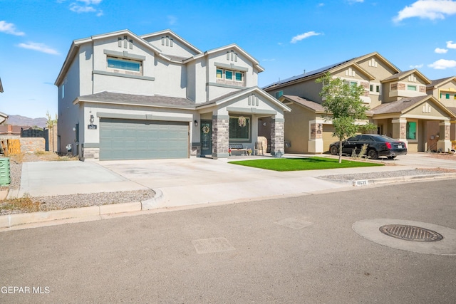 10625 Hidden Links Pl, El Paso, TX 79924 - craftsman inspired home with an attached garage, stone siding, stucco siding, and concrete driveway