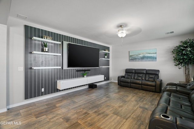 10625 Hidden Links Pl, El Paso, TX 79924 - living room with a ceiling fan, wood finished floors, and an accent wall