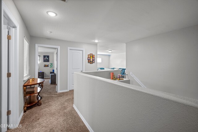 10625 Hidden Links Pl, El Paso, TX 79924 - hallway with carpet flooring, an upstairs landing, and recessed lighting