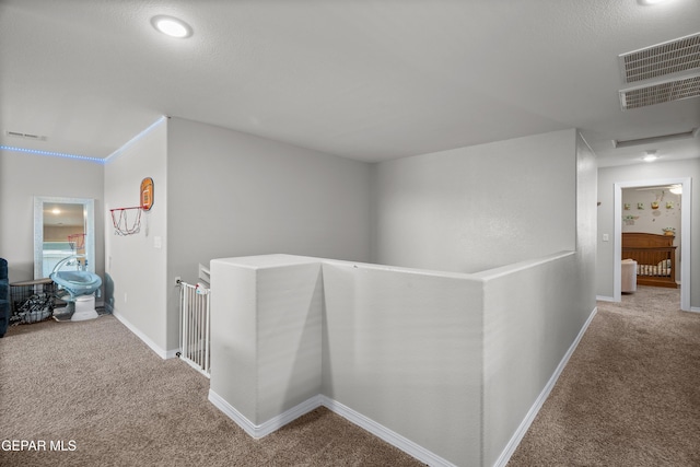 10625 Hidden Links Pl, El Paso, TX 79924 - corridor with an upstairs landing and carpet floors