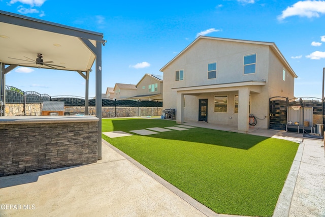 10625 Hidden Links Pl, El Paso, TX 79924 - rear view of property with a patio, a ceiling fan, a fenced backyard, and stucco siding