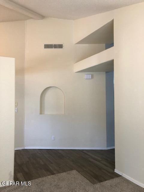 6392 Franklin Gate Dr, El Paso, TX 79912 - unfurnished room featuring wood finished floors and beamed ceiling