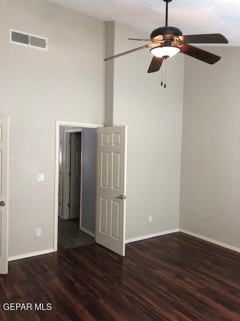 6392 Franklin Gate Dr, El Paso, TX 79912 - unfurnished room with a ceiling fan and wood finished floors
