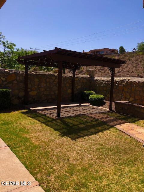 6392 Franklin Gate Dr, El Paso, TX 79912 - view of yard with a patio and a pergola