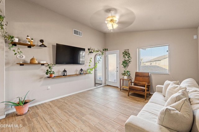 11625 Flor Clavel St, El Paso, TX 79927 - living room featuring a ceiling fan and vaulted ceiling