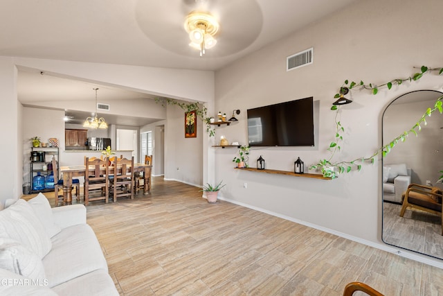 11625 Flor Clavel St, El Paso, TX 79927 - living area featuring ceiling fan, light wood-type flooring, and lofted ceiling