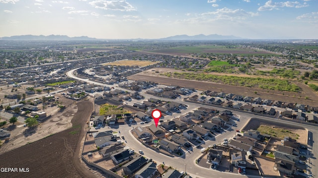 11625 Flor Clavel St, El Paso, TX 79927 - aerial view of property's location featuring mountains and nearby suburban area